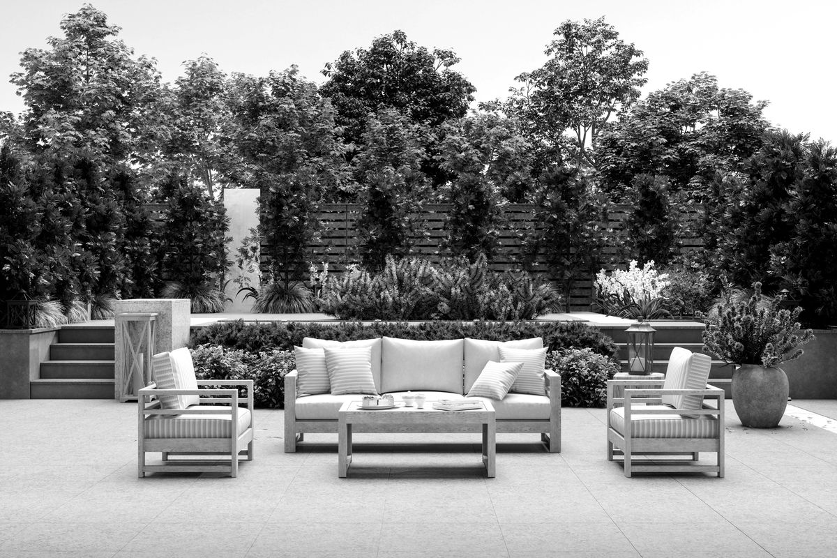 Outdoor patio seating area at a short-term rental property