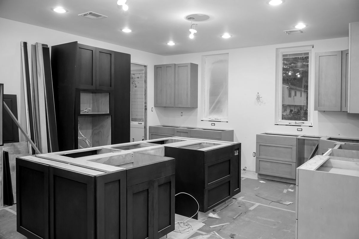 Kitchen renovation in progress with new cabinetry