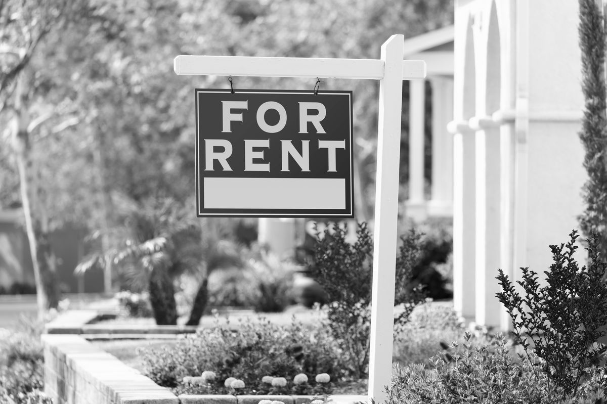 For Rent sign in front of an investment property
