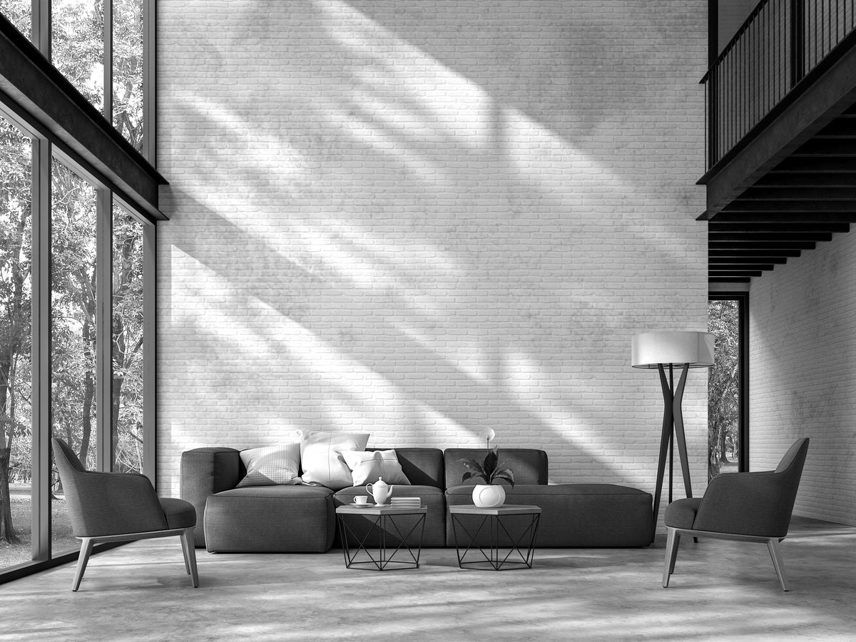 Modern loft interior with floor-to-ceiling windows