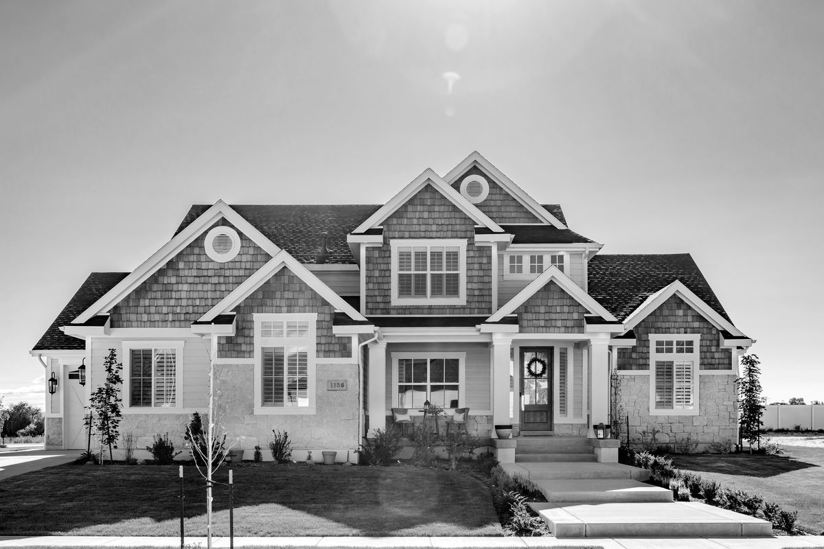 Large investment property with front porch and landscaping