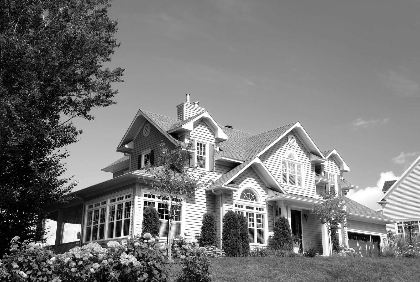 A large gabled retreat home of the kind operated as a rural short-term rental, financed on a DSCR loan qualified on nightly revenue