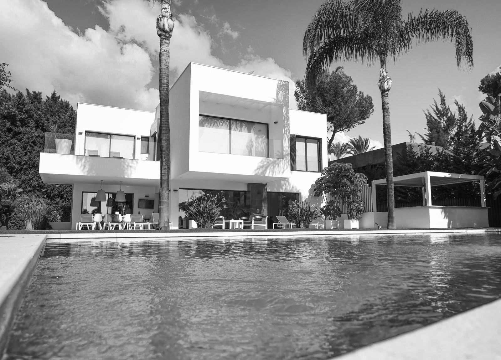 A luxury short-term rental home with a pool that an investor could finance as part of a destination-market portfolio